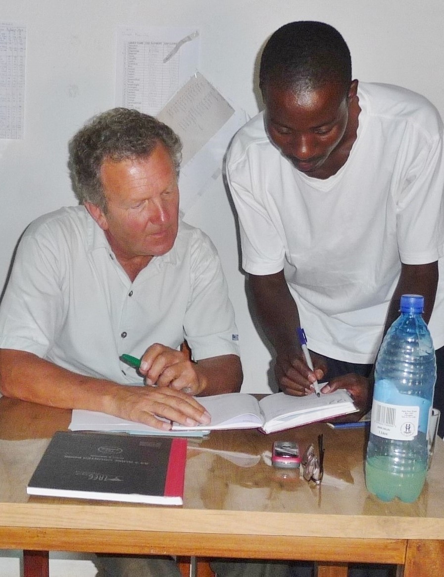 Early AfID volunteer Bob Gooderick, with member of the Micro Loan foundation in Malawi